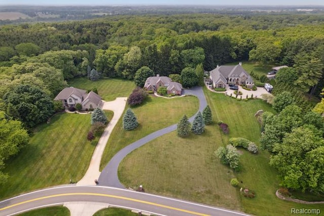 3468 High Hillcrest Dr, Howell, MI 48843 - aerial view of property and surrounding area with a forest