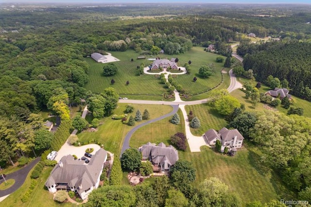 3468 High Hillcrest Dr, Howell, MI 48843 - aerial view of property's location featuring a heavily wooded area