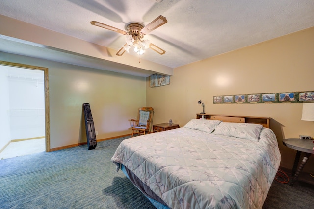 4470 Peach Ridge Ave NW, Grand Rapids, MI 49544 - carpeted bedroom with baseboards, ceiling fan, and a textured ceiling