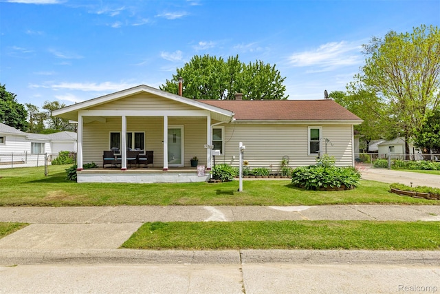 19200 Roger St, Melvindale, MI 48122 - view of front of home featuring a porch and a chimney