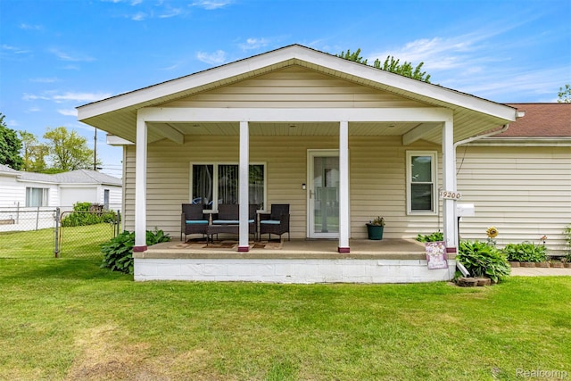 19200 Roger St, Melvindale, MI 48122 - rear view of property featuring a porch