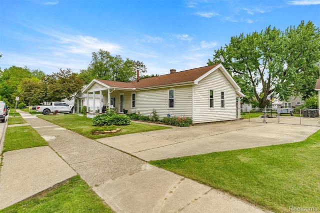 19200 Roger St, Melvindale, MI 48122 - single story home with concrete driveway and covered porch