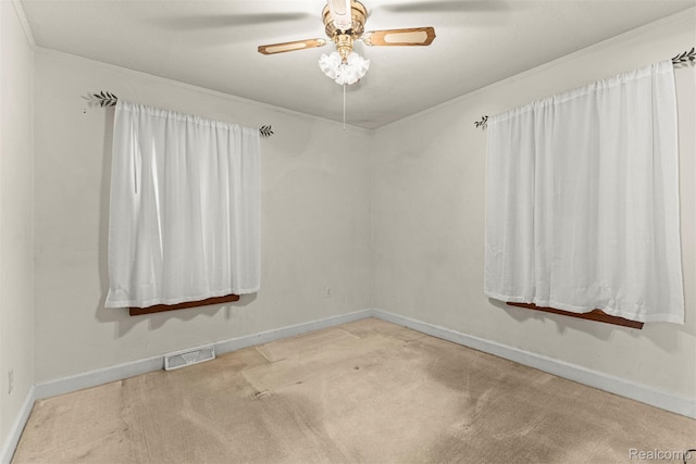 19200 Roger St, Melvindale, MI 48122 - empty room featuring baseboards, carpet flooring, ceiling fan, and crown molding
