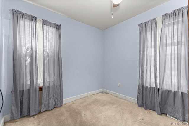 19200 Roger St, Melvindale, MI 48122 - carpeted empty room featuring baseboards and ceiling fan