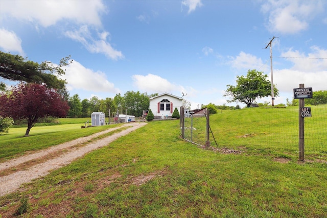 15250 142nd Ave, Big Rapids, MI 49307 - view of front of house with driveway and a front yard
