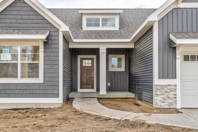 14984 Fillmore St, West Olive, MI 49460 - property entrance with board and batten siding and a shingled roof