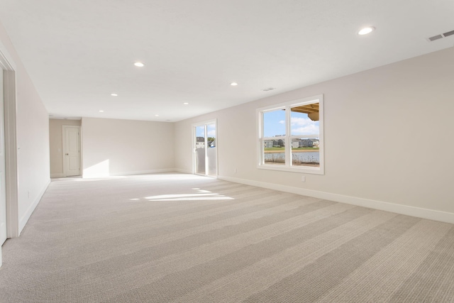14984 Fillmore St, West Olive, MI 49460 - unfurnished room with light carpet, recessed lighting, and baseboards