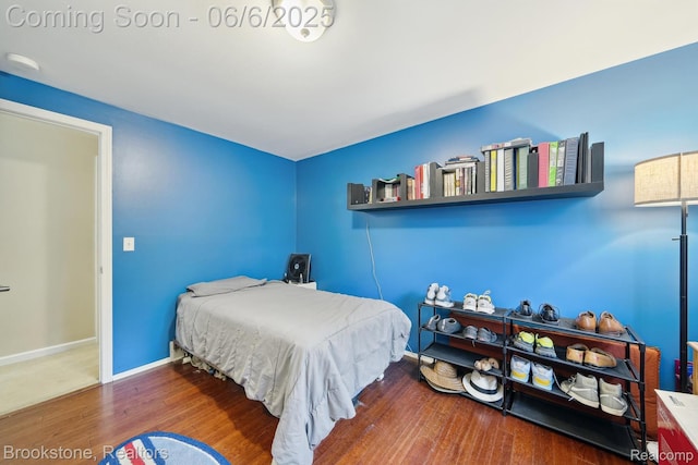 2831 Aurora Dr, Lake Orion, MI 48360 - bedroom featuring wood finished floors and baseboards