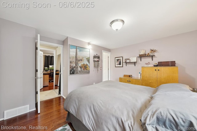 2831 Aurora Dr, Lake Orion, MI 48360 - bedroom featuring dark wood finished floors and baseboards