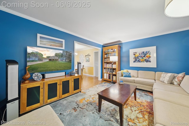 2831 Aurora Dr, Lake Orion, MI 48360 - living room featuring crown molding, wood finished floors, and baseboards