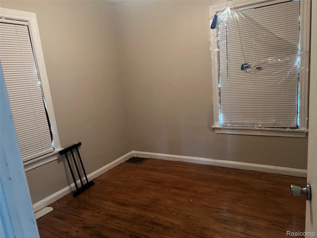 20294 Moenart St, Detroit, MI 48234 - spare room featuring wood finished floors and baseboards