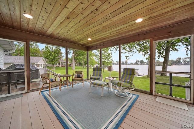 227 Lake View Dr, Hudson, MI 49247 - sunroom / solarium with a water view