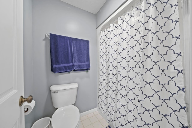 227 Lake View Dr, Hudson, MI 49247 - full bath with toilet, baseboards, a shower with shower curtain, and tile patterned flooring