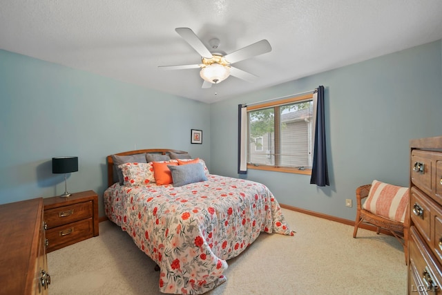 227 Lake View Dr, Hudson, MI 49247 - carpeted bedroom featuring ceiling fan and baseboards