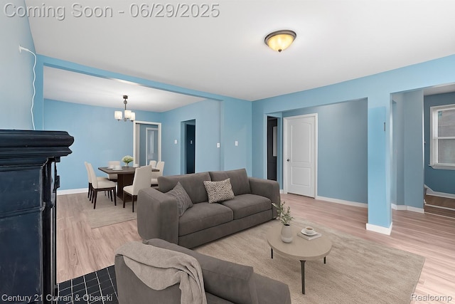 4220 Webb St, Detroit, MI 48204 - living room featuring a chandelier and wood finished floors
