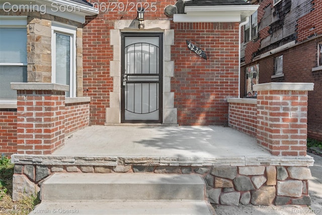 4220 Webb St, Detroit, MI 48204 - doorway to property with brick siding