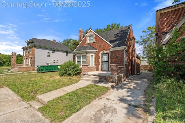 4220 Webb St, Detroit, MI 48204 - view of front of home featuring brick siding and a chimney