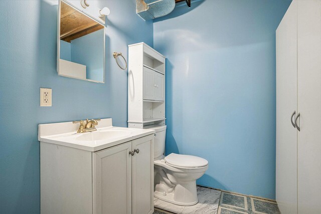 298 Chasseral Ct NW, Comstock Park, MI 49321 - bathroom featuring toilet and vanity