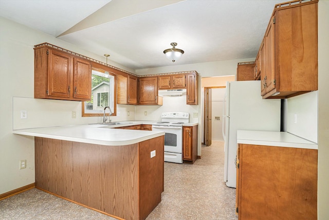 298 Chasseral Ct NW, Comstock Park, MI 49321 - kitchen featuring white appliances, a peninsula, and brown cabinetry