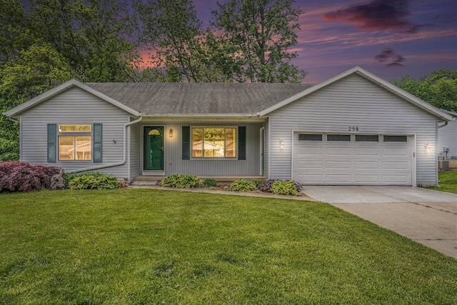 298 Chasseral Ct NW, Comstock Park, MI 49321 - ranch-style house featuring an attached garage, concrete driveway, a yard, and roof with shingles