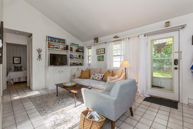 15826 Lakeshore Rd Unit 1, Union Pier, MI 49129 - living area with light tile patterned floors, high vaulted ceiling, and baseboards