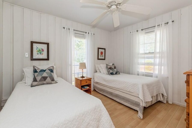 15826 Lakeshore Rd Unit 1, Union Pier, MI 49129 - bedroom with light wood finished floors and a ceiling fan
