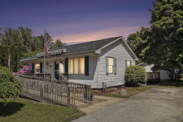 68149 Lawndale St, Edwardsburg, MI 49112 - ranch-style home featuring covered porch and roof with shingles