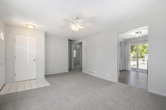 68149 Lawndale St, Edwardsburg, MI 49112 - empty room with carpet, ceiling fan, and baseboards
