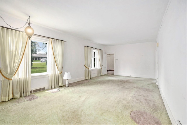 269 E 24th St, Holland, MI 49423 - spare room with carpet flooring and baseboards