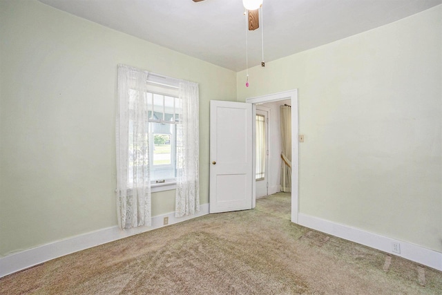 269 E 24th St, Holland, MI 49423 - carpeted spare room with a ceiling fan and baseboards