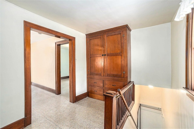 269 E 24th St, Holland, MI 49423 - hall with an upstairs landing and baseboards