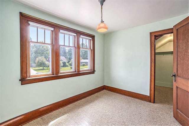 269 E 24th St, Holland, MI 49423 - carpeted empty room featuring baseboards