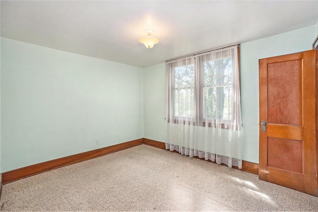 269 E 24th St, Holland, MI 49423 - spare room featuring baseboards