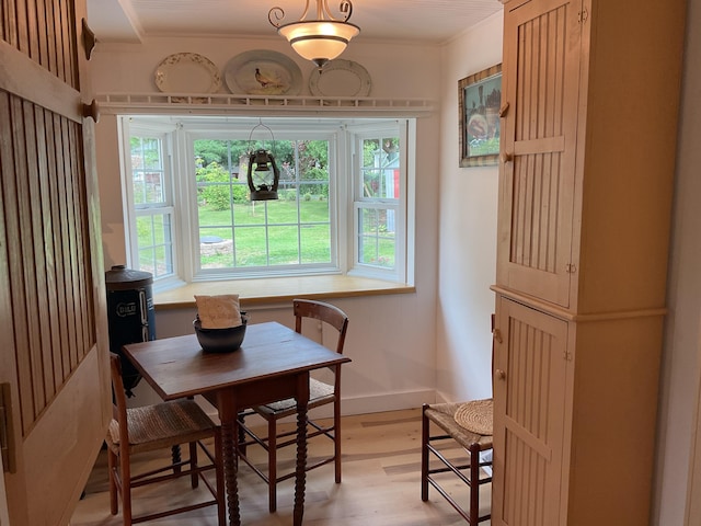 50 N Sprague St, Coldwater, MI 49036 - dining room with crown molding, light wood-style floors, and baseboards