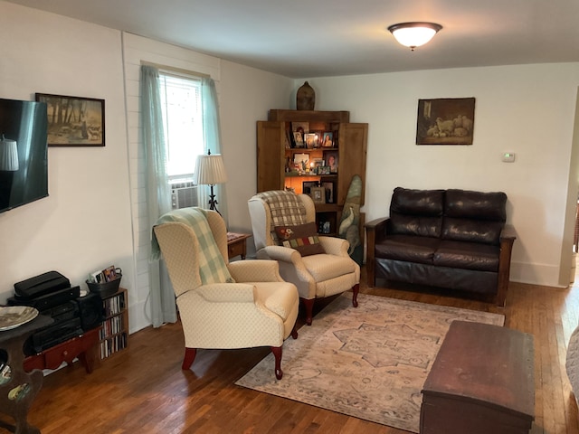 50 N Sprague St, Coldwater, MI 49036 - living area with wood finished floors and cooling unit