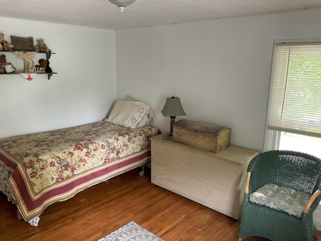 50 N Sprague St, Coldwater, MI 49036 - bedroom with wood finished floors and multiple windows