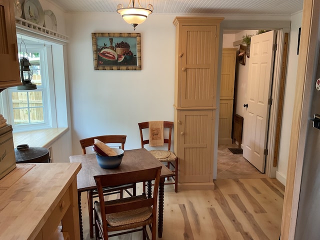 50 N Sprague St, Coldwater, MI 49036 - dining space with light wood-style floors and ornamental molding