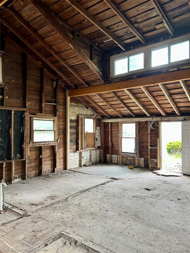 2935 Jackson Blvd, Highland, MI 48356 - miscellaneous room featuring vaulted ceiling