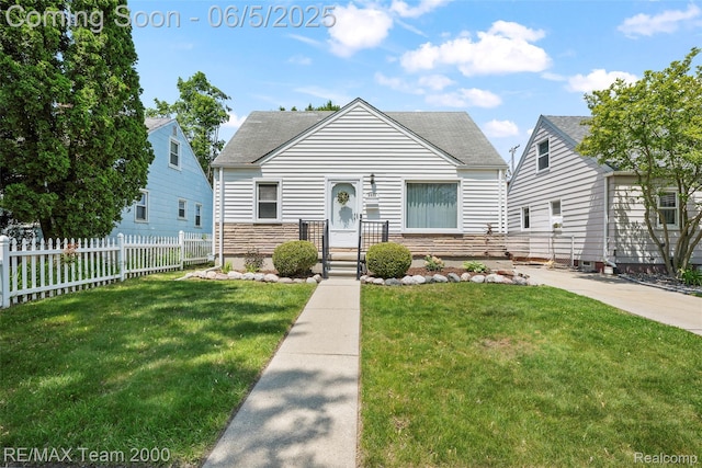 2922 Bailey Ave, Wyandotte, MI 48146 - bungalow-style home with a shingled roof and stone siding