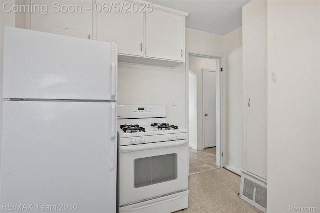 2922 Bailey Ave, Wyandotte, MI 48146 - kitchen featuring white appliances and white cabinetry