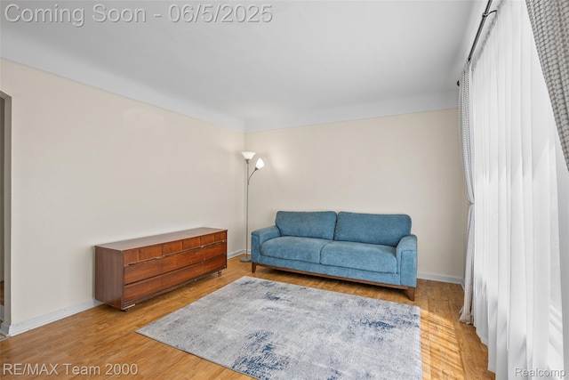 2922 Bailey Ave, Wyandotte, MI 48146 - sitting room with wood finished floors and baseboards