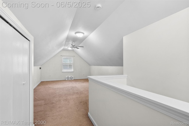 2922 Bailey Ave, Wyandotte, MI 48146 - additional living space with vaulted ceiling, light colored carpet, baseboards, and ceiling fan