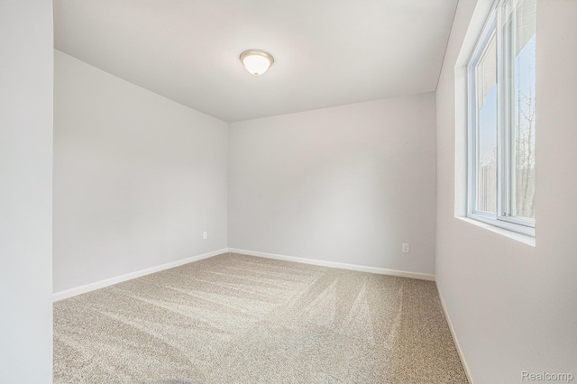 6270 Tommy Trl, Mount Morris, MI 48458 - carpeted empty room with baseboards