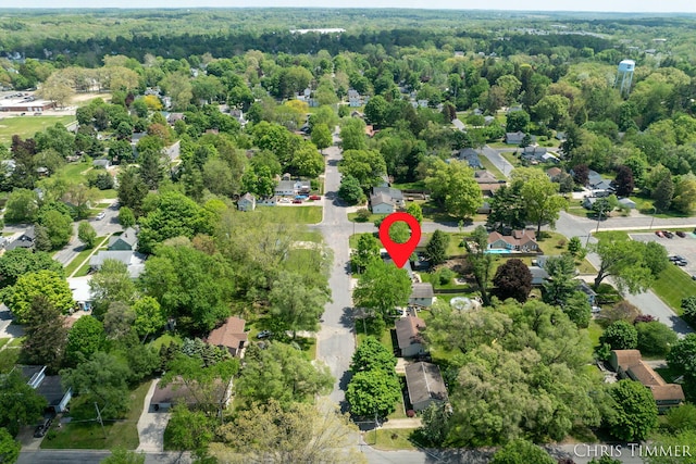 510 W Marshall St, Hastings, MI 49058 - aerial overview of property's location featuring a heavily wooded area and nearby suburban area