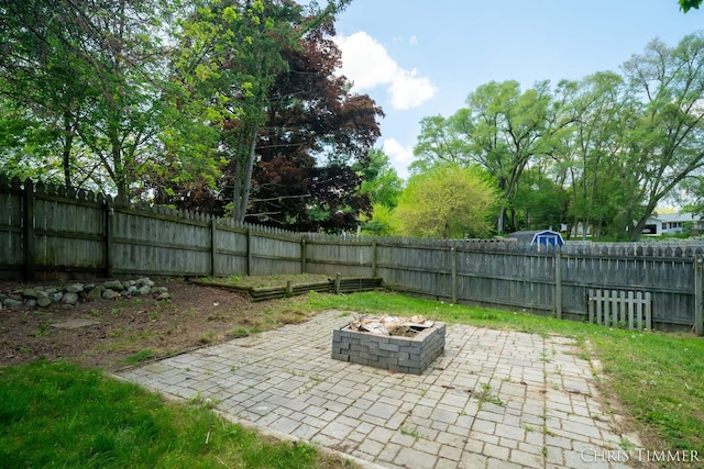 510 W Marshall St, Hastings, MI 49058 - fenced backyard with an outdoor fire pit and a patio