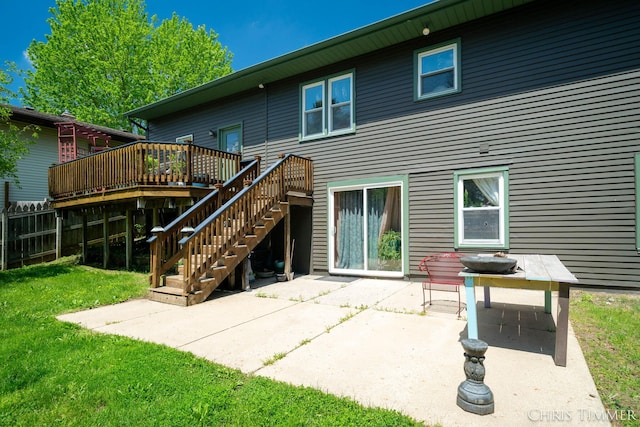 510 W Marshall St, Hastings, MI 49058 - back of property with a wooden deck, stairway, and a patio