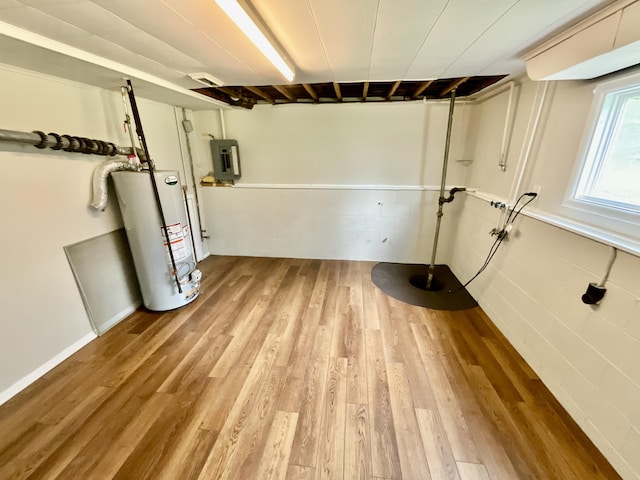 4408 Arbor Dr, Okemos, MI 48864 - below grade area with water heater, electric panel, and wood finished floors