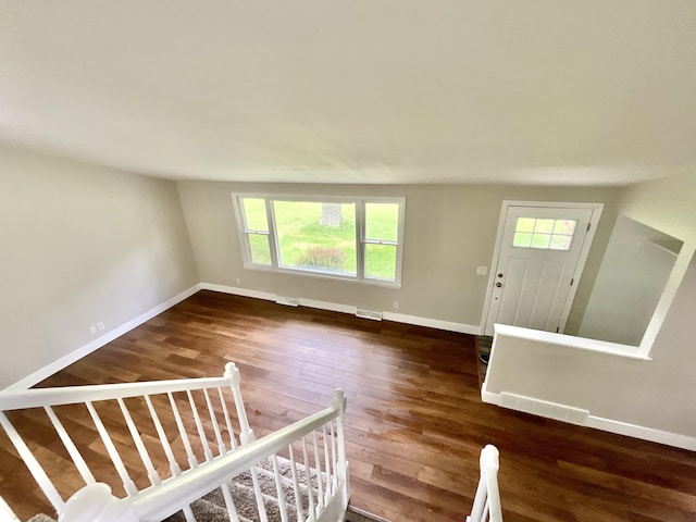 4408 Arbor Dr, Okemos, MI 48864 - foyer entrance with baseboards and wood finished floors