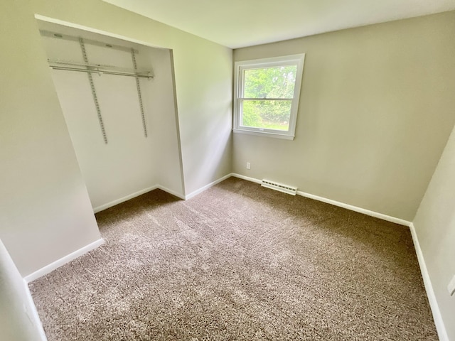 4408 Arbor Dr, Okemos, MI 48864 - unfurnished bedroom with carpet flooring, baseboards, and a closet