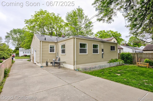 4511 Rosewold Ave, Royal Oak, MI 48073 - back of property featuring a patio and a chimney